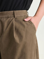 Cotton Washed And Distressed Pleated Pants